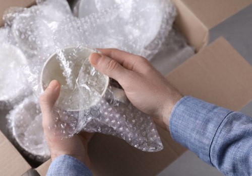 Wrapping Fragile Items in Bubble Wrap or Packing Paper